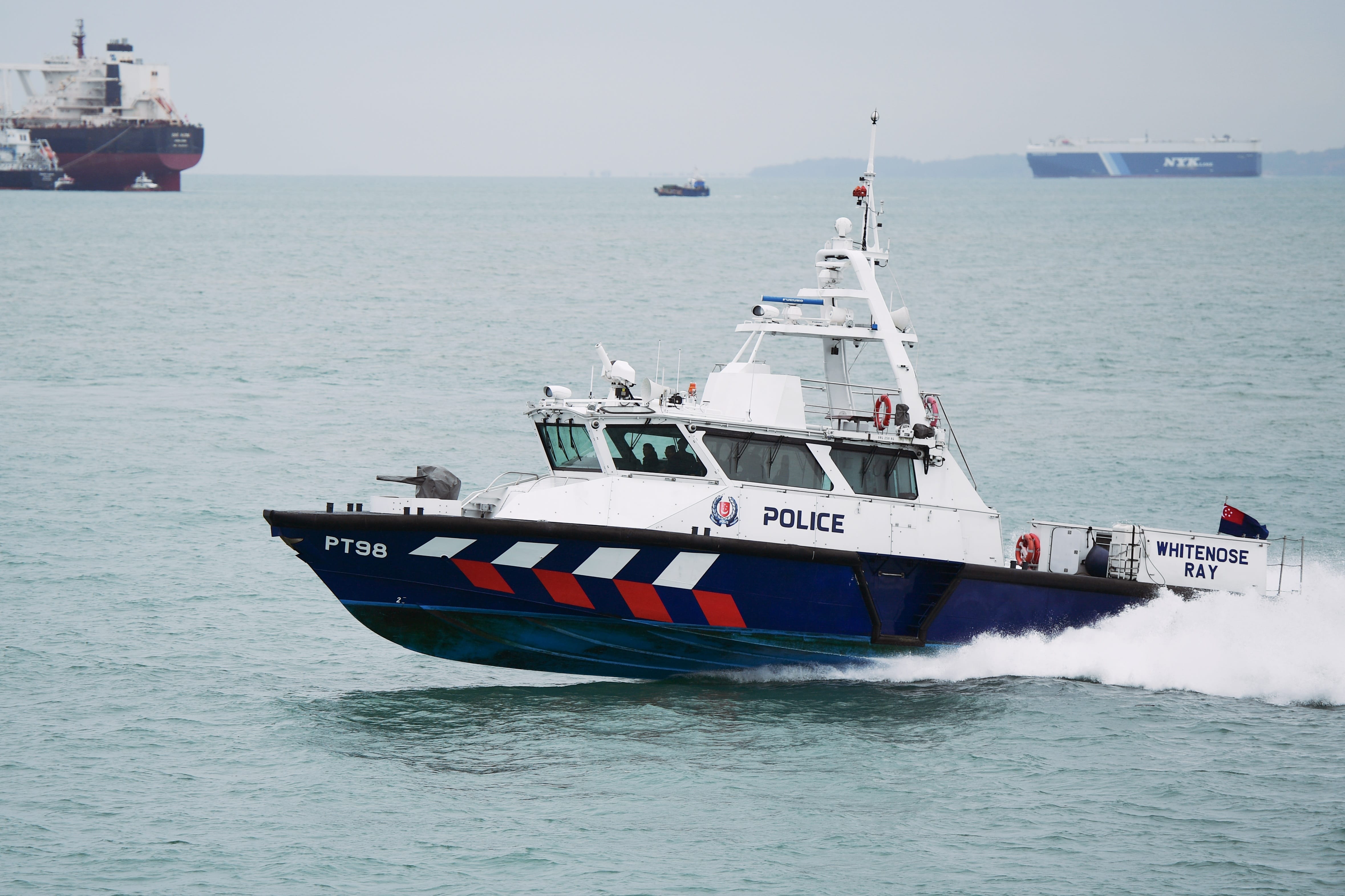 The Singapore Police Force (SPF) Police Coast Guard’s (PCG) 5th Generation PT Class Patrol Craft intercepting the vessel. 